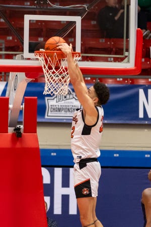 Cowley's Corey Thomas dunks in the first round of the NJCAA D1 Men's Basketball Tournament. Thomas in April 2024 committed to play for the Bradley men's basketball team.