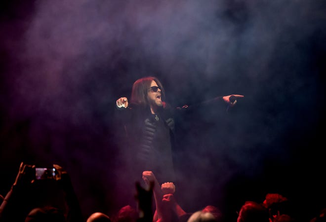 Queensrÿche lead vocalist Todd La Torre works the crowd during the band's performance Wednesday, April 10, 2024 at the Peoria Civic Center Theater.
