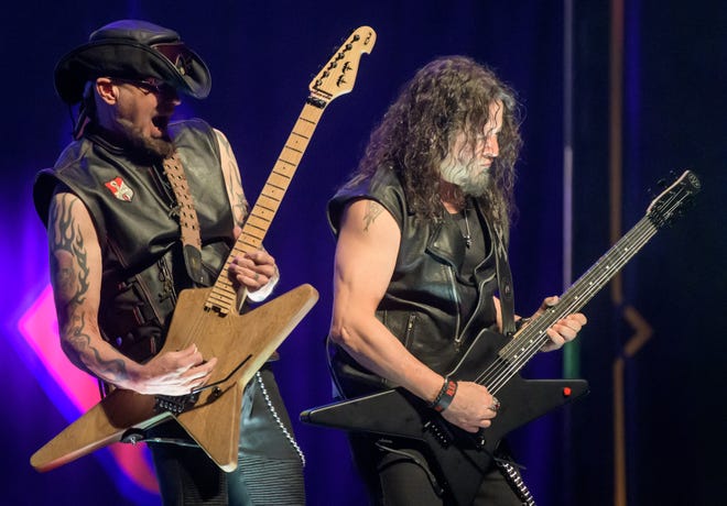 Guitarists Mike Stone, left, and Michael Wilton of Queensryche perform Wednesday, April 10, 2024 at the Peoria Civic Center Theater.