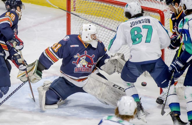 The puck slips past Peoria goaltender Nick Latinovich for a Pensacola score in the second period of Game 2 of the first round of the SPHL playoffs Saturday, April 13, 2024 at the Peoria Civic Center. The Rivermen advanced to the semifinals with a 6-1 victory.
