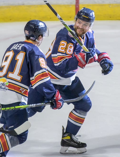 Peoria's Meirs Moore (28) and Alec Baer celebrate Moore's goal against Pensacola in the second period of Game 2 of the first round of the SPHL playoffs Saturday, April 13, 2024 at the Peoria Civic Center. The Rivermen advanced to the semifinals with a 6-1 victory.