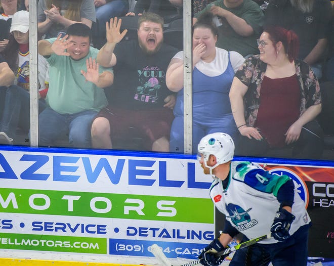 A group of Rivermen fans say bid farewell to Troy Button and the Pensacola Ice Flyers near the end of Game 2 of the first round of the SPHL playoffs Saturday, April 13, 2024 at the Peoria Civic Center. The Rivermen advanced to the semifinals with a 6-1 victory.