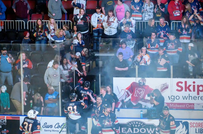 A crowd of fans congratulate the Peoria Rivermen as they exit the ice after Game 2 of the first round of the SPHL playoffs Saturday, April 13, 2024 at the Peoria Civic Center. The Rivermen advanced to the semifinals with a 6-1 victory.