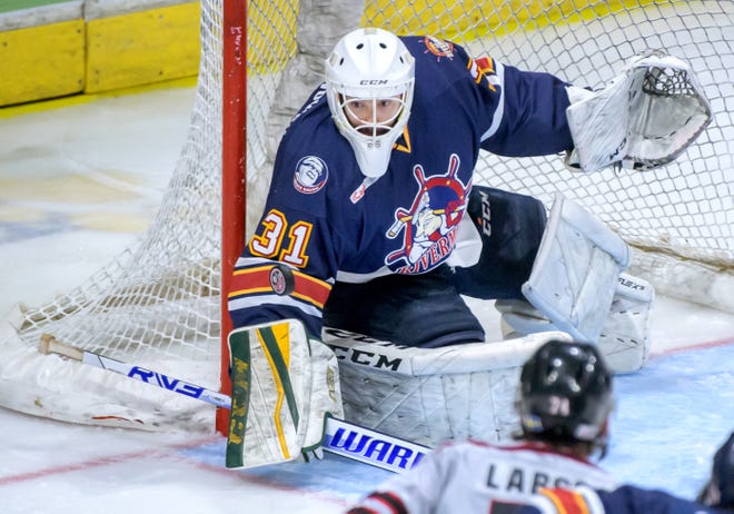 Peoria goaltender Nick Latinovich blocks a shot from the Huntsville Havoc in the third period of the deciding game of the SPHL President's Cup finals Sunday, April 28, 2024 at the Peoria Civic Center.
