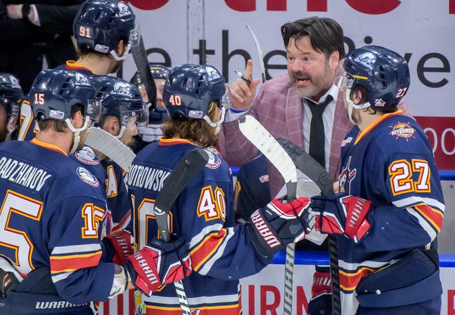 Peoria Rivermen head coach Jean-Guy Trudel gathers his team as they battle the Huntsville Havoc in the finals seconds of the third period of the deciding game of the SPHL President's Cup finals Sunday, April 28, 2024 at the Peoria Civic Center.